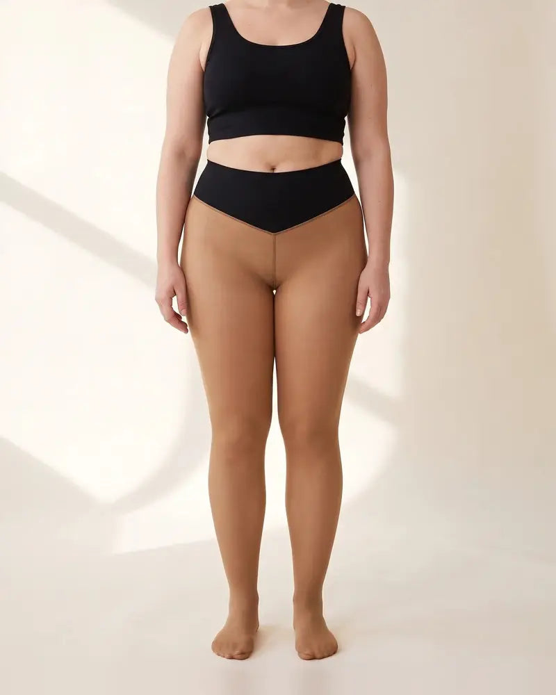 Woman wearing ThermaSheer tights in Tan, front view