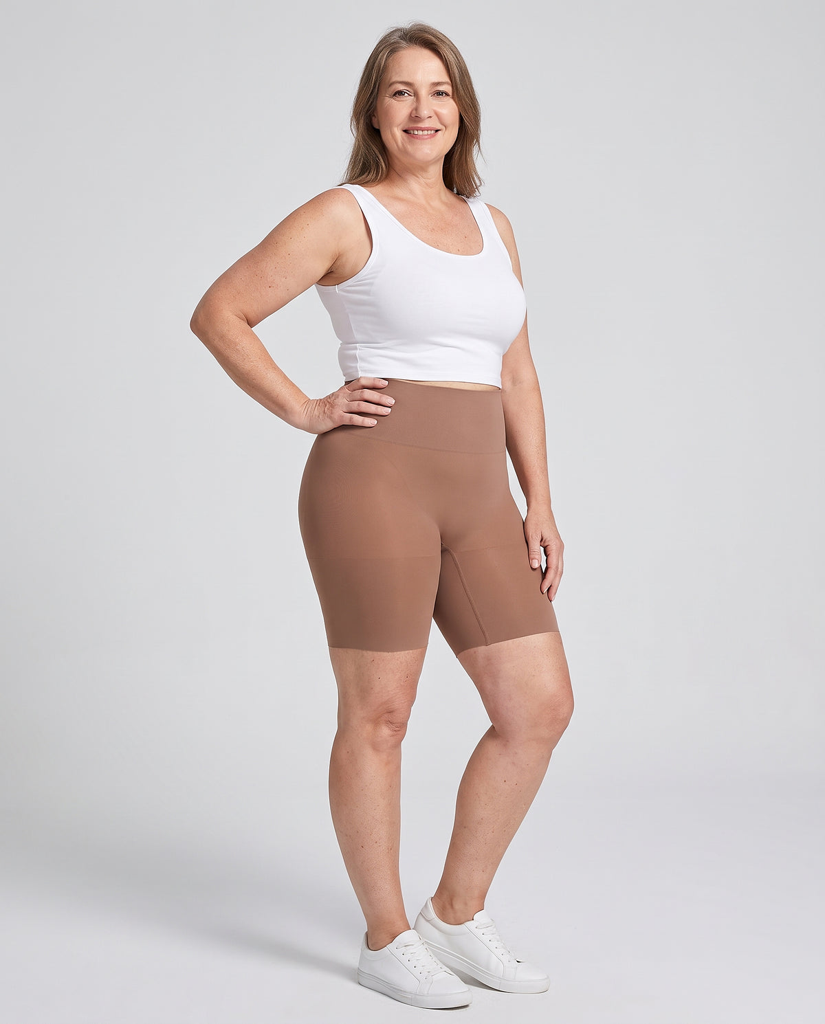 Haven high-waist smoothing shorts in mocha on a plus-size woman, full length