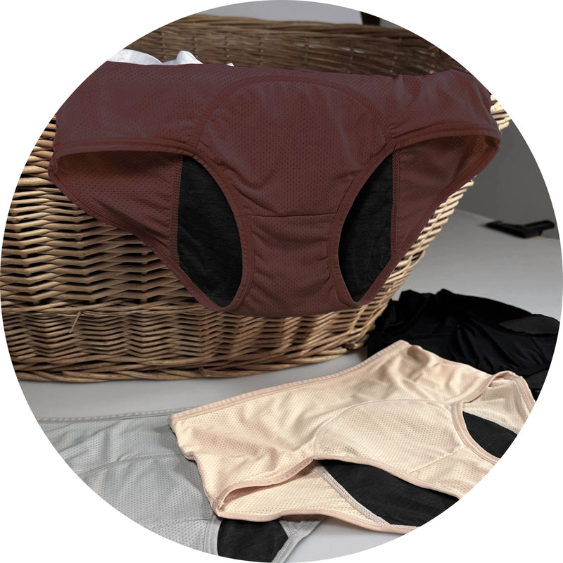 Haven leakproof underwear folded in a laundry basket, ready to machine wash and dry