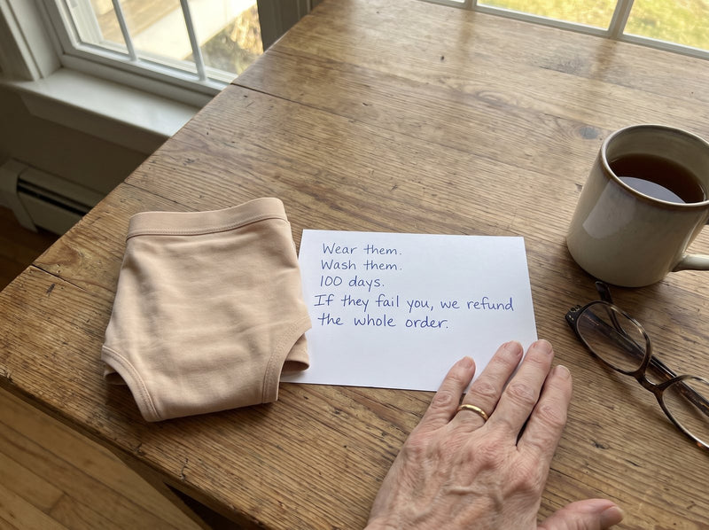 A folded pair of Haven underwear beside a handwritten card that reads: Wear them. Wash them. 100 days. If they fail you, we refund the whole order.